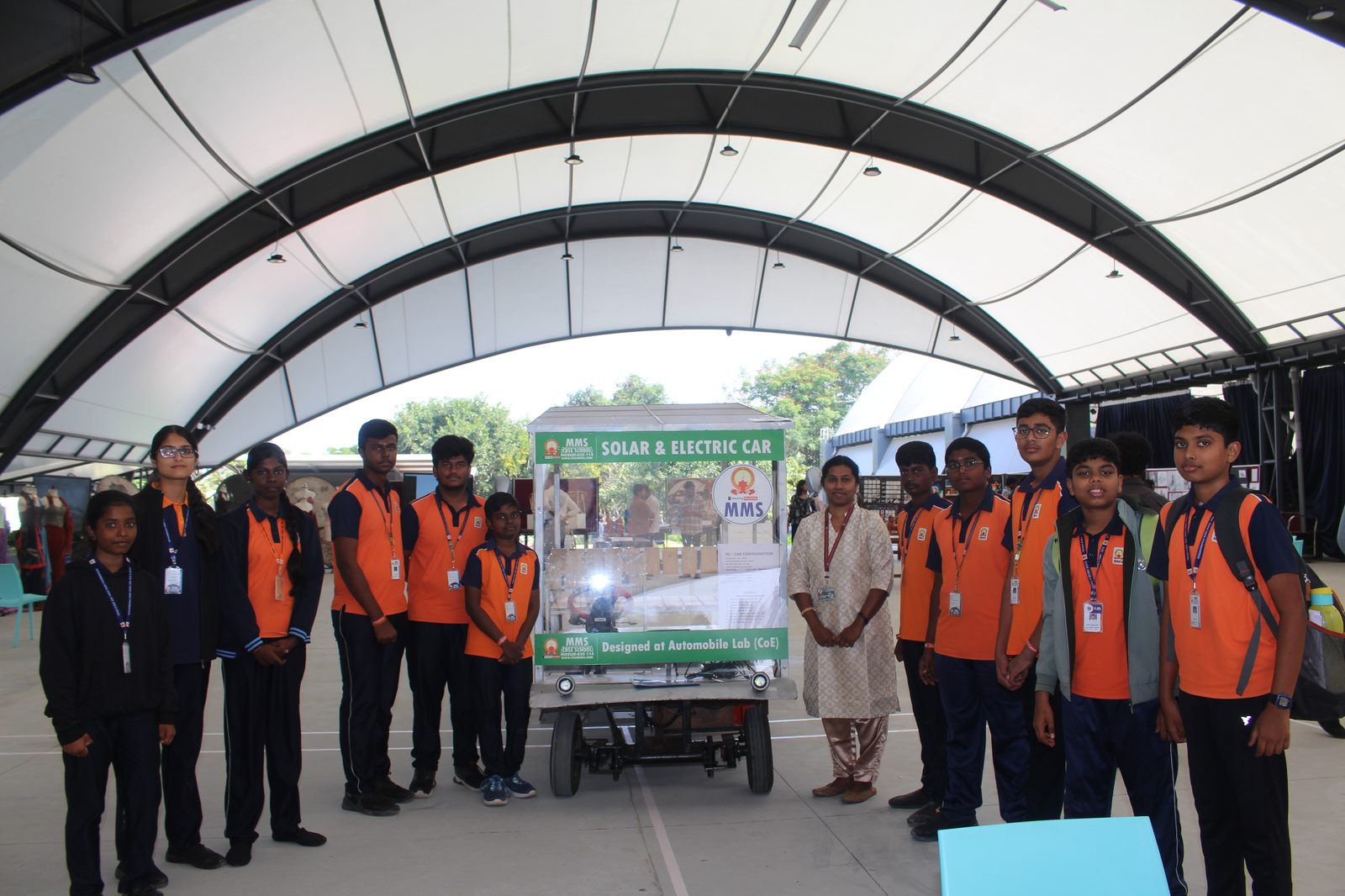 The MMS Automobile Lab team with the Solar and Electric Car at Alliance NOVA Fest