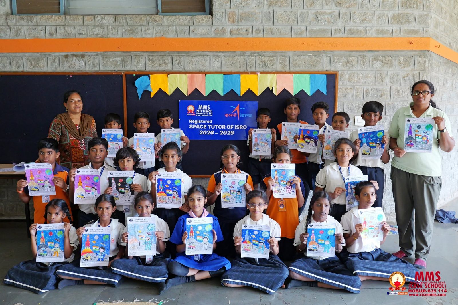 Students and faculty after the India Space Week colouring activity