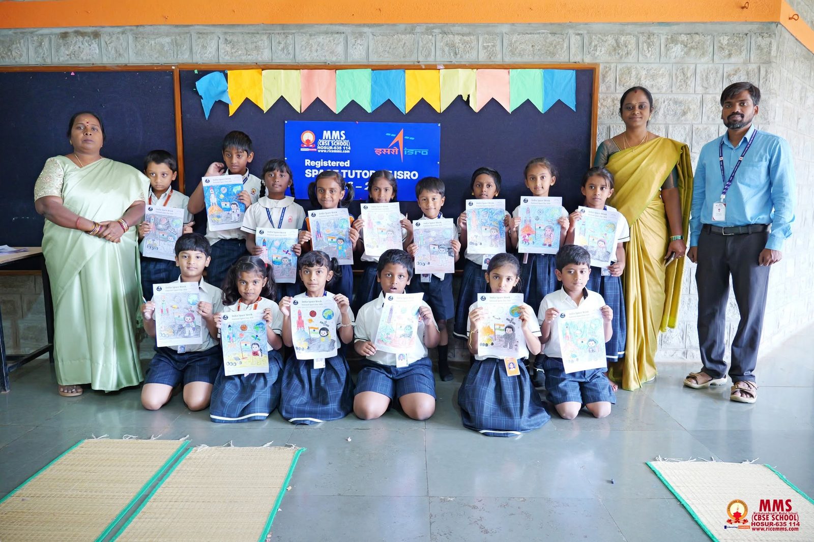 The youngest MMS learners with their space themed colouring artwork