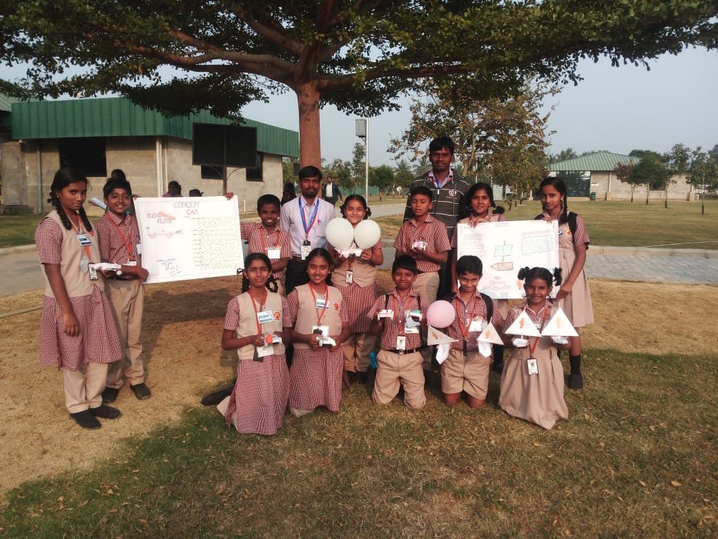 MMS students with their AWIM Olympics concept car presentation boards on campus