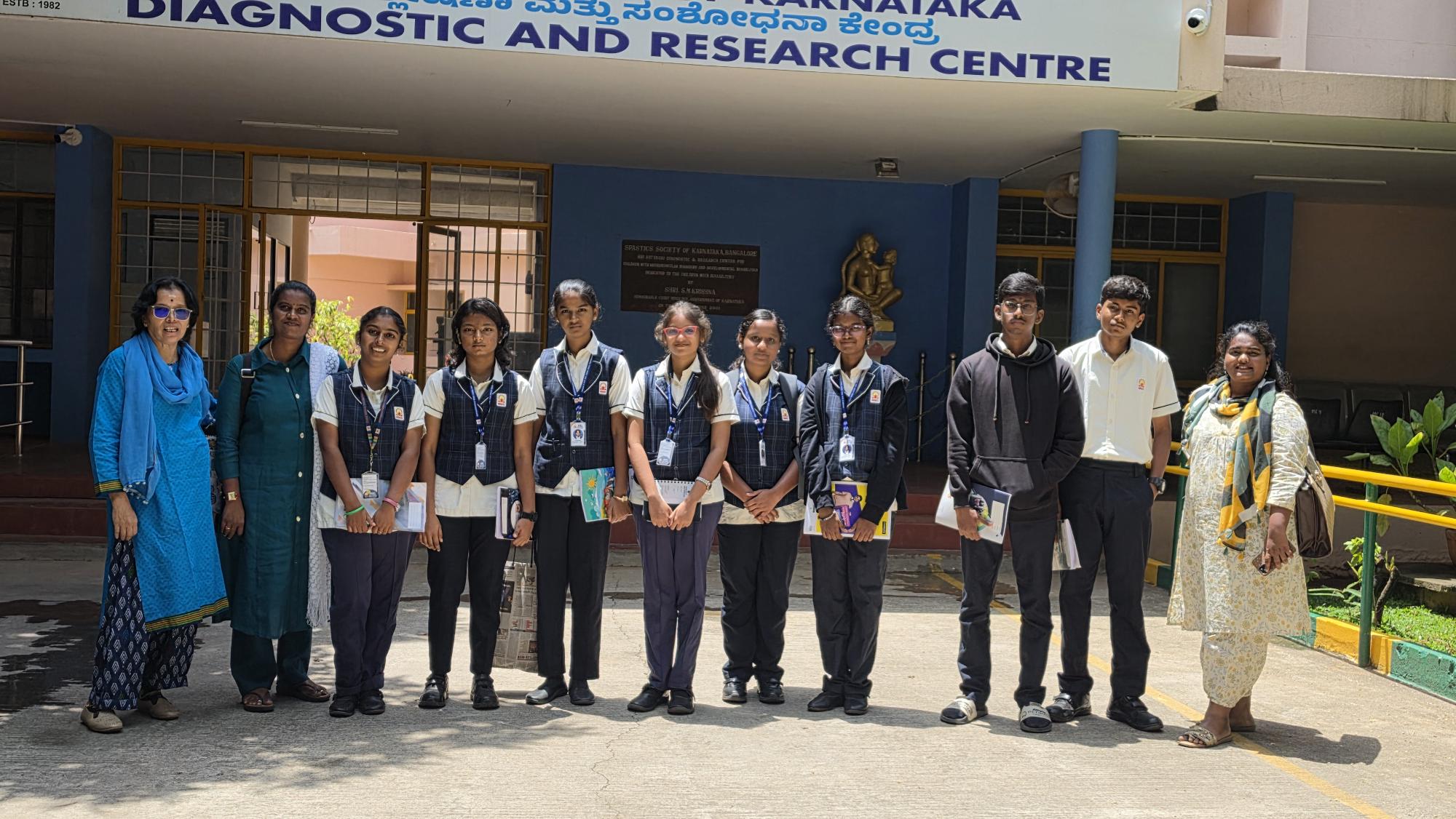 Class XI and XII Psychology students and MMS staff outside the Spastics Society of Karnataka Diagnostic and Research Centre
