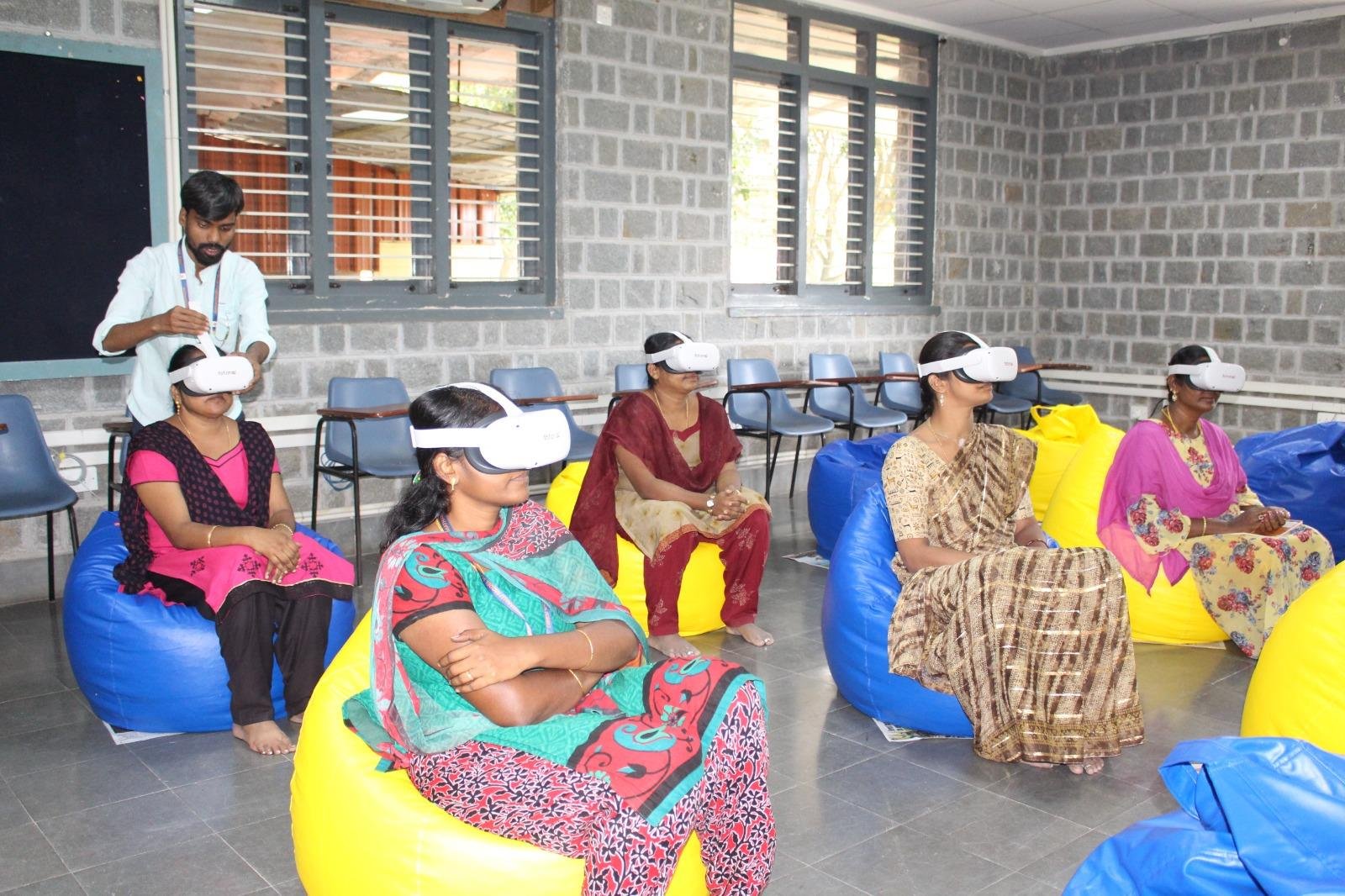 Teachers being trained to use VR headsets