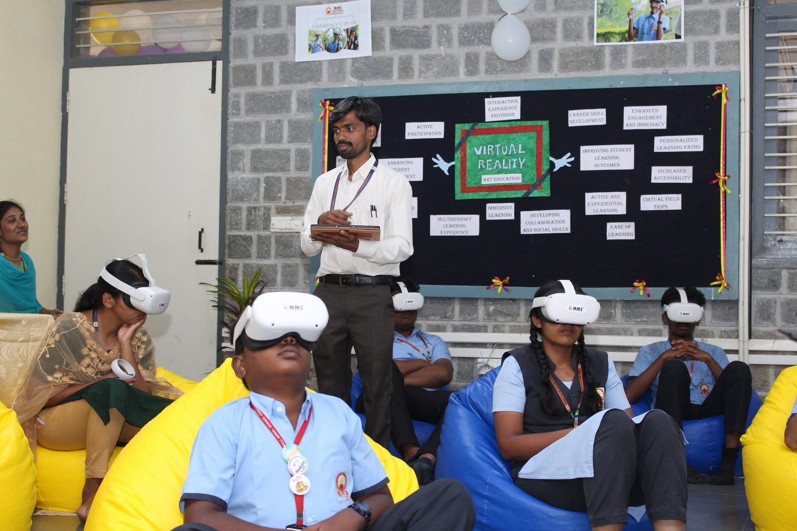 VR Lab classroom session with a bulletin board on Virtual Reality in art education