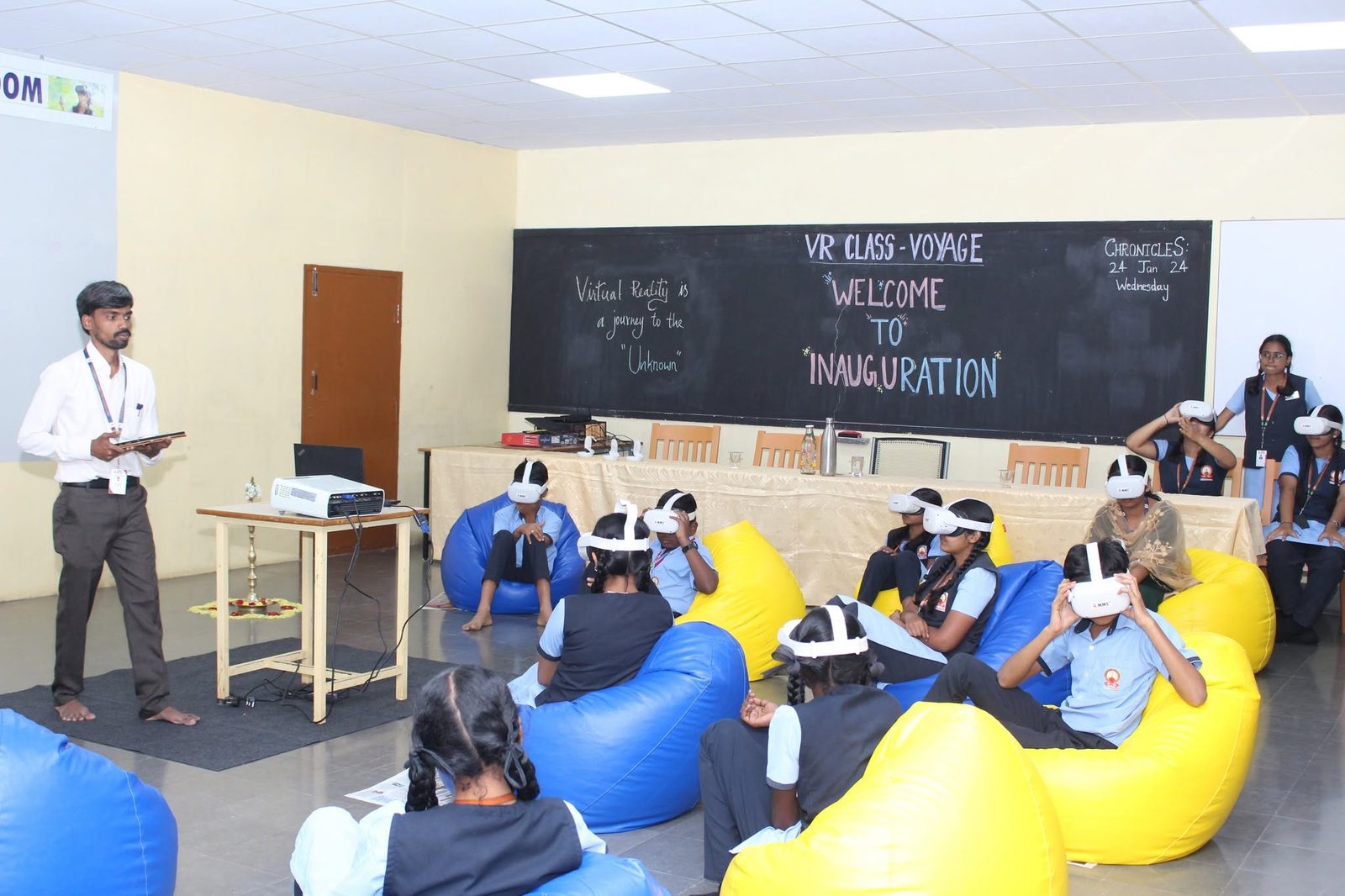 Wide view of the VR Class Voyage inauguration with guests and students in the Virtual Reality Classroom