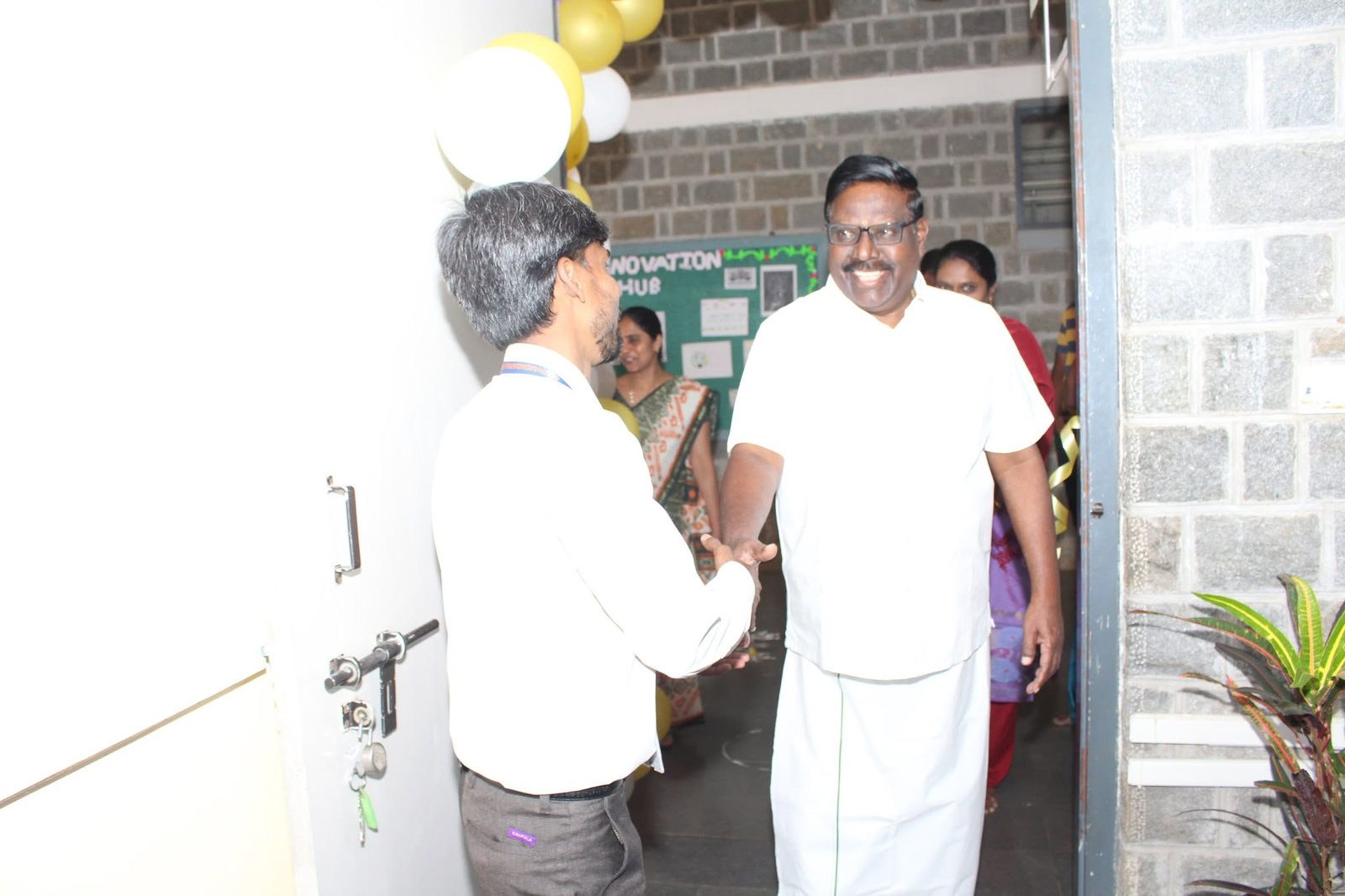 A guest being welcomed during the inauguration day festivities